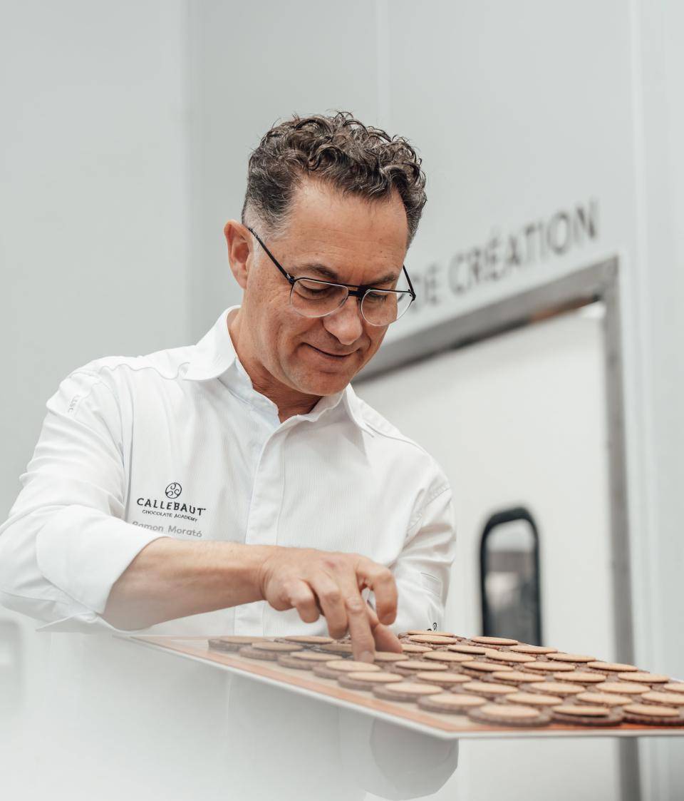 Chef with tray of cookies