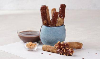 Churros with chocolate velvet sauce