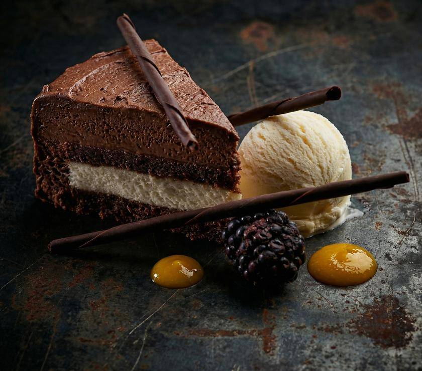 Cake decorated with chocolate pencils