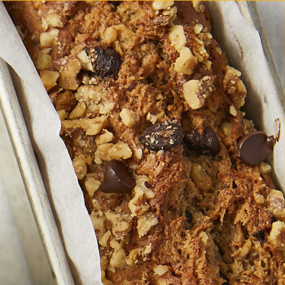 Banana nut bread with chocolate chips in a loaf pan
