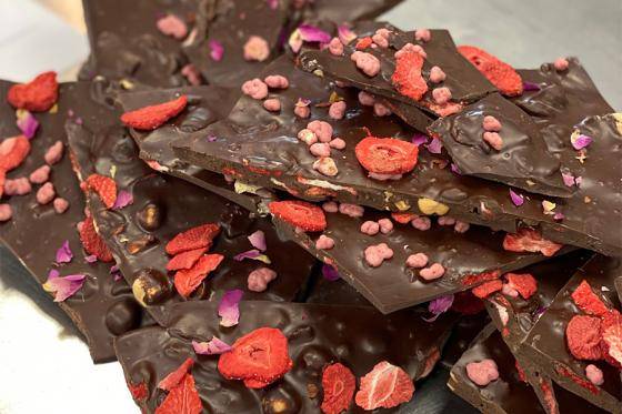 breaking chocolate slabs